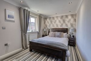 Bedroom One- click for photo gallery